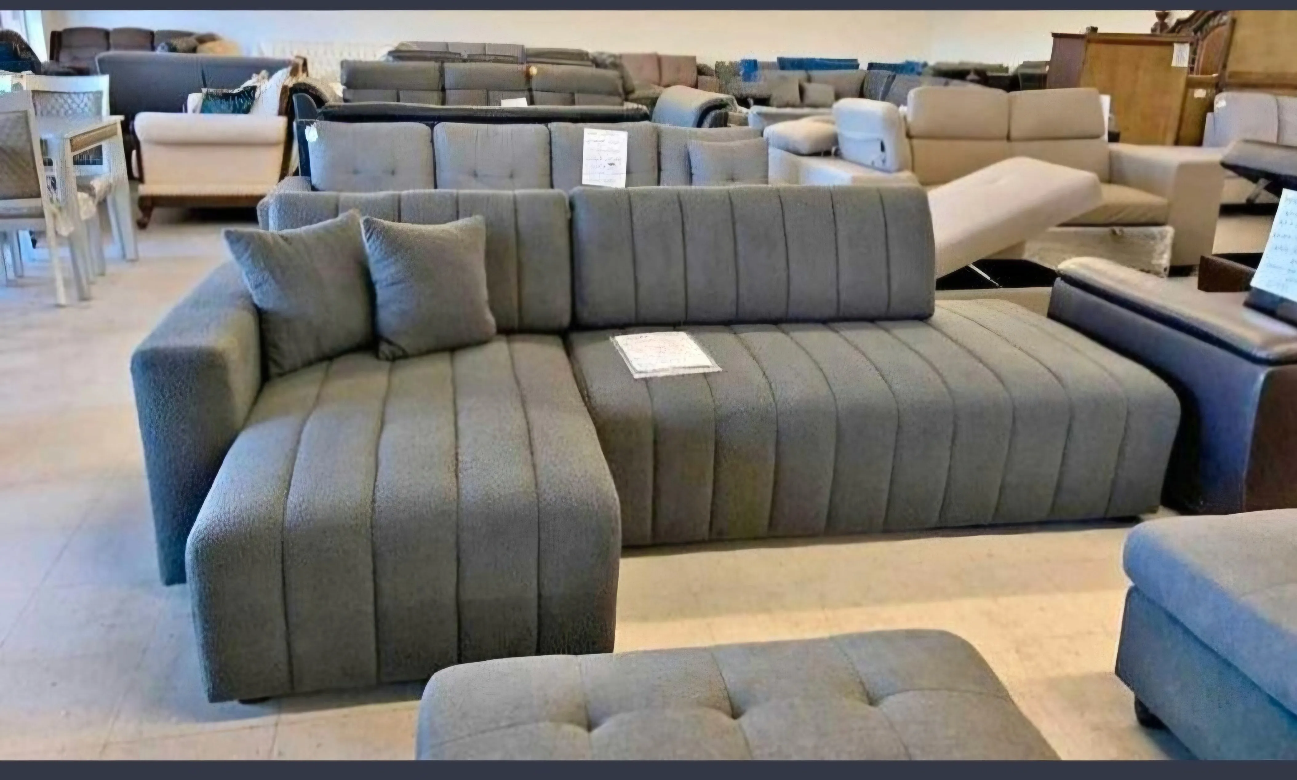 Black Fabric Sectional With Throw Pillows- Model Fall