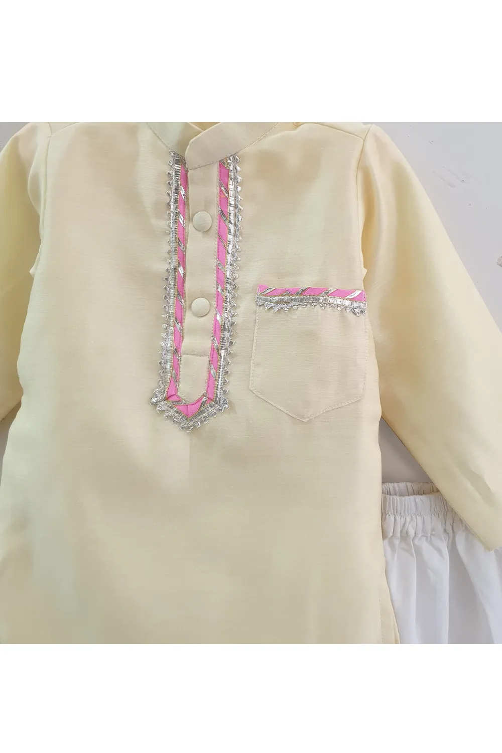 Pastel yellow lace work kurta with white pyjama