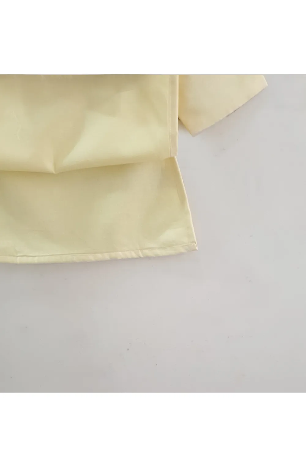 Pastel yellow lace work kurta with white pyjama