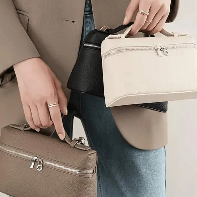 Stylish Loreen Faux Leather Handbag with Adjustable Shoulder Strap and Gold Logo Emblem