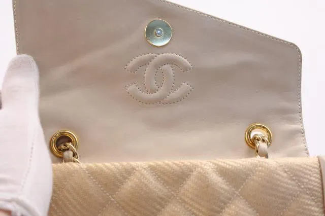 Vintage CHANEL Raffia and Leather Flap Handbag