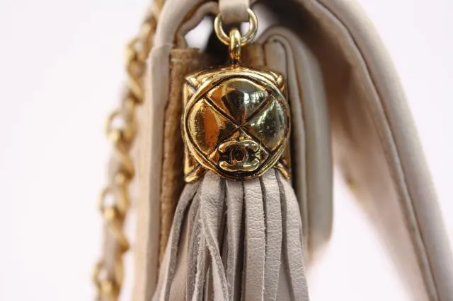 Vintage CHANEL Raffia and Leather Flap Handbag