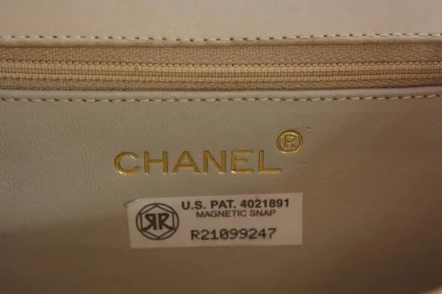 Vintage CHANEL Raffia and Leather Flap Handbag